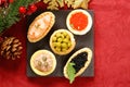 Christmas appetizers. Small tartlets with caviar and pate.