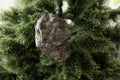 Christmas in the army. ball and gift box, military uniform, closeup view Royalty Free Stock Photo