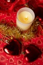 Christmas aroma candle around  red decorations. Christmas holiday concept Royalty Free Stock Photo