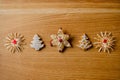 Christmas arrangement of gringerbread trees and straw winter stars