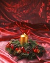 Christmas Ornaments. Burning Golden Candle. Royalty Free Stock Photo