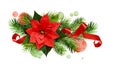 Christmas arrangement with poinsettia flower, pine twigs, red cu Royalty Free Stock Photo