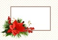 Christmas arrangement with red poinsettia flower and brown frame on white and polka dot