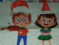 Christmas Artwork: Glass Painting on Caroling Kids