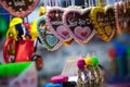 Christmas atmosphere of the city at night. Christmas sweets. Gingerbread-bears. Gingerbread-heart. Caramel rolls.. Christmas Fair