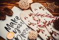 Christmas decorations and socks on wooden brown background with candle Royalty Free Stock Photo