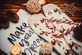 Christmas decorations and socks on wooden brown background with candle Royalty Free Stock Photo