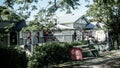 Christmas in Australia where its summer with white picket fences and Christmas balls hanging from tropical trees Royalty Free Stock Photo