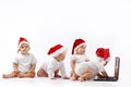 Christmas babies with laptop