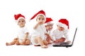 Christmas babies with laptop