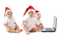 Christmas babies with laptop