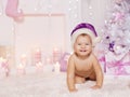 Christmas Baby Kid in Santa Hat, Child Xmas Pink Room Royalty Free Stock Photo