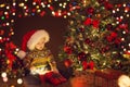Christmas Baby Open Present Gift Box under Xmas Tree, Happy Kid