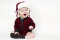 Christmas baby with red shirt and hat Royalty Free Stock Photo