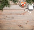 Christmas background. Antique wooden table, pine branch and vintage items. Silver tray, fork and spoon. Copy space Royalty Free Stock Photo