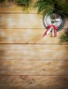 Christmas background. Antique wooden table, pine branch and vintage items. Silver tray, fork and spoon, tied with a pink bow. Copy Royalty Free Stock Photo