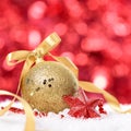 Christmas background with bauble and ribbon on the snow square Royalty Free Stock Photo