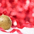 Christmas background with bauble and ribbon on the snow square Royalty Free Stock Photo