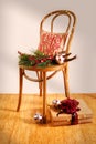 Christmas background with bentwood chair against blank wall backdrop. Royalty Free Stock Photo