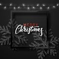 Christmas background black color with realistic garlands and beautiful snowflakes in the frame. Royalty Free Stock Photo