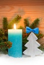 Advent candle and wood fir tree . Christmas card. Royalty Free Stock Photo