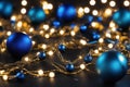 Christmas background. Blue Christmas toys of de-focused lights. Space for text. Black background.