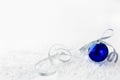 Christmas background with blue ornament in snow Royalty Free Stock Photo