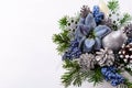Christmas background with blue silk poinsettias and silver glitter pear Royalty Free Stock Photo
