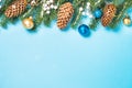 Christmas flatlay background - fir tree and decorations on blue Royalty Free Stock Photo