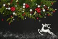 Christmas Abstract Composition with Reindeer and Winter Greenery Royalty Free Stock Photo