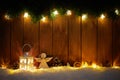 Christmas background with branches and decoration on wooden board Royalty Free Stock Photo