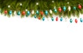 Christmas background with branches and a garland. Royalty Free Stock Photo