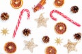 Christmas Background. Christmas Candy Cane And Gold Decorations On White Background. Flat Lay