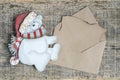 Christmas background with carved bear and blank letter and envelope on wood Royalty Free Stock Photo