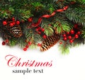 Christmas background. Christmas boarder with fir tree branch with cones and ornament. Christmas baubles in golden and red colour. Royalty Free Stock Photo