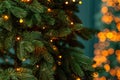Christmas background, Christmas tree and magical blurred bokeh lights in the background. Copy space Royalty Free Stock Photo
