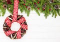 Christmas background. Christmas wreath decorated with ribbon. Copy space