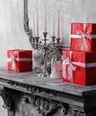 Christmas background concept. Ancient fireplace with a candlestick and gift boxes. Royalty Free Stock Photo