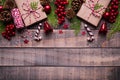 Christmas background concept. Top view of Christmas gift box red sock with spruce branches, pine cones, red berries Royalty Free Stock Photo