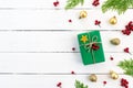 Christmas background concept. Top view of Christmas green and red gift box with spruce branches, pine cones Royalty Free Stock Photo