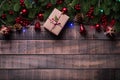 Christmas background concept. Top view of Christmas gift box red sock with spruce branches, pine cones, red berries Royalty Free Stock Photo