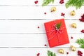 Christmas background concept. Top view of Christmas green and red gift box with spruce branches, pine cones Royalty Free Stock Photo