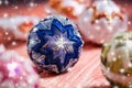 Christmas background, decoration. Christmas balls on a wooden table. Soft focus. Sparkles and bubbles. Abstract background. Royalty Free Stock Photo