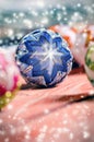 Christmas background, decoration. Christmas balls on a wooden table. Soft focus. Sparkles and bubbles. Abstract background. Royalty Free Stock Photo