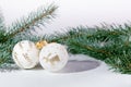 Christmas background, decoration and spruce branches. Christmas balls on a white background. Soft focus. Sparkles and bubbles. Abs Royalty Free Stock Photo