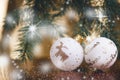 Christmas background, decoration and spruce branches. Christmas balls on a white background. Soft focus. Sparkles and bubbles. Abs Royalty Free Stock Photo