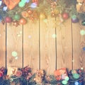 Christmas background with decoration on wooden board. Vintage filter effect. Royalty Free Stock Photo