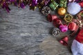 Christmas background with decorations and gift boxes on old wooden background