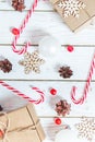 Christmas background with decorations, gift boxes on a white wooden table. Christmas background. Flat lay. top view with copy Royalty Free Stock Photo