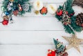 Christmas background with decorations and gift boxes on wooden Royalty Free Stock Photo